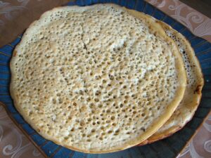 Lahuh is a bubbly fermented crepe eaten by Yemeni Jews