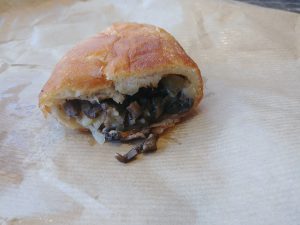 Pirozhki cut open to reveal the filling