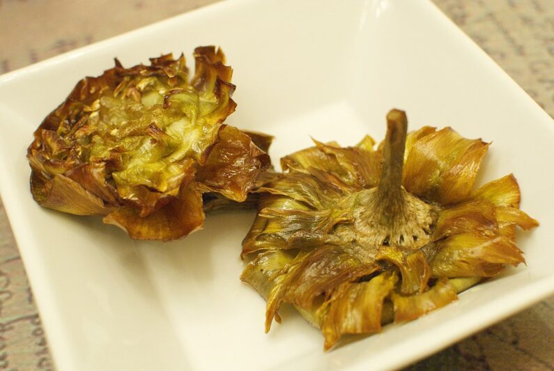 Carciofi alla Giudia or Jewish style artichokes. This Jewish food name clearly identifies the origins of the dish.
