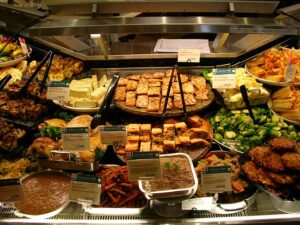 An array of mostly Ashkenazi foods in a takeout counter